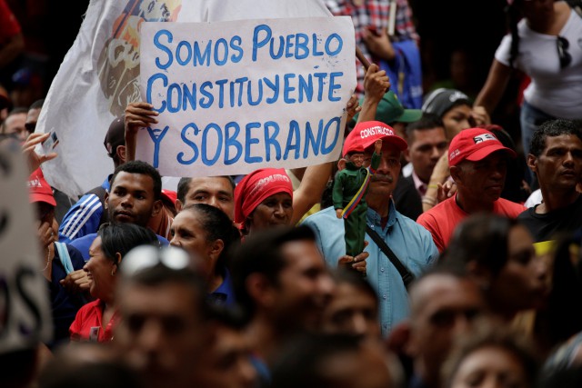 A banner is seen during a gathering with Venezuela's President Maduro outside the CNE where he presented his proposal to set up a National Constituent Assembly, in Caracas